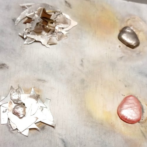 Judy Larson's Recycling Scrap Into Sheet Metal - , Metalwork, Stamping, Stamps, Butane Torch, Soldering, Solder, Placing scraps on unused areas